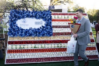 Fresh produce is arranged in the shape of the American flag at the annual Easter Egg Roll